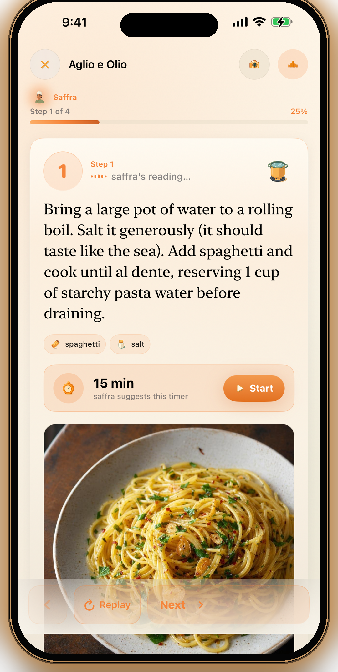 Cooking Mode step 1 — Saffra reads the step aloud with ingredient chips and a suggested 15-minute timer